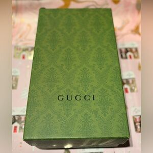 Empty damaged Gucci box